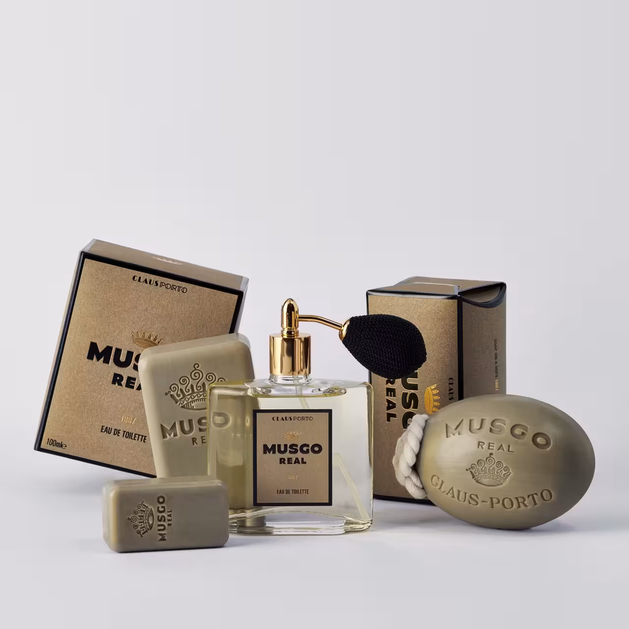 Seife Musgo Real Verpackung beige gold mit Flakon, Zerstäuber und Seifenstück in olivgrün