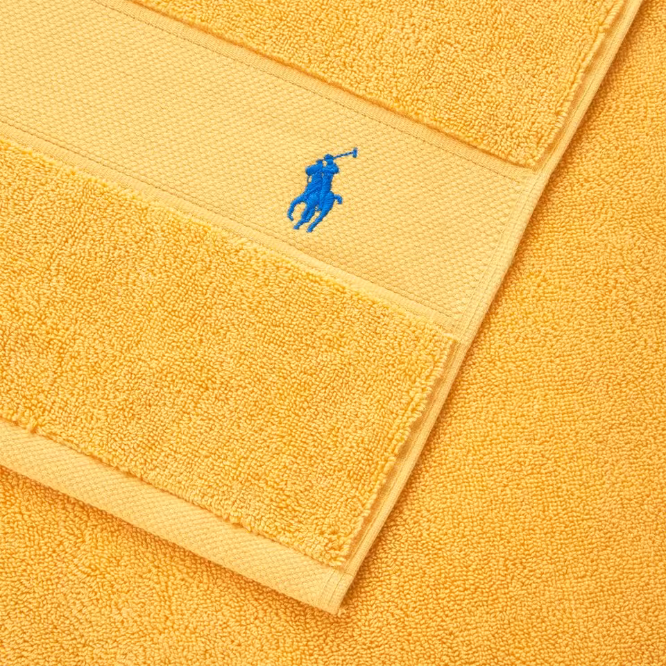 Polo Player Frottier gelb Detail Logo Stickerei