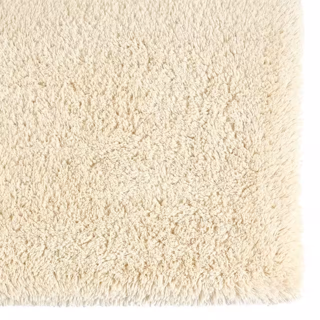 Badteppich Shag creme auf weiß Detail