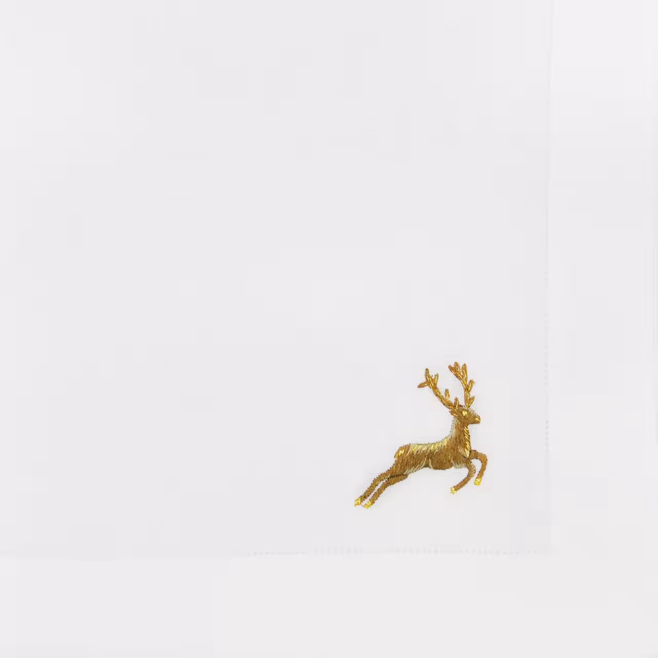 Serviette weiß mit Stickerei Hirsch in gold
