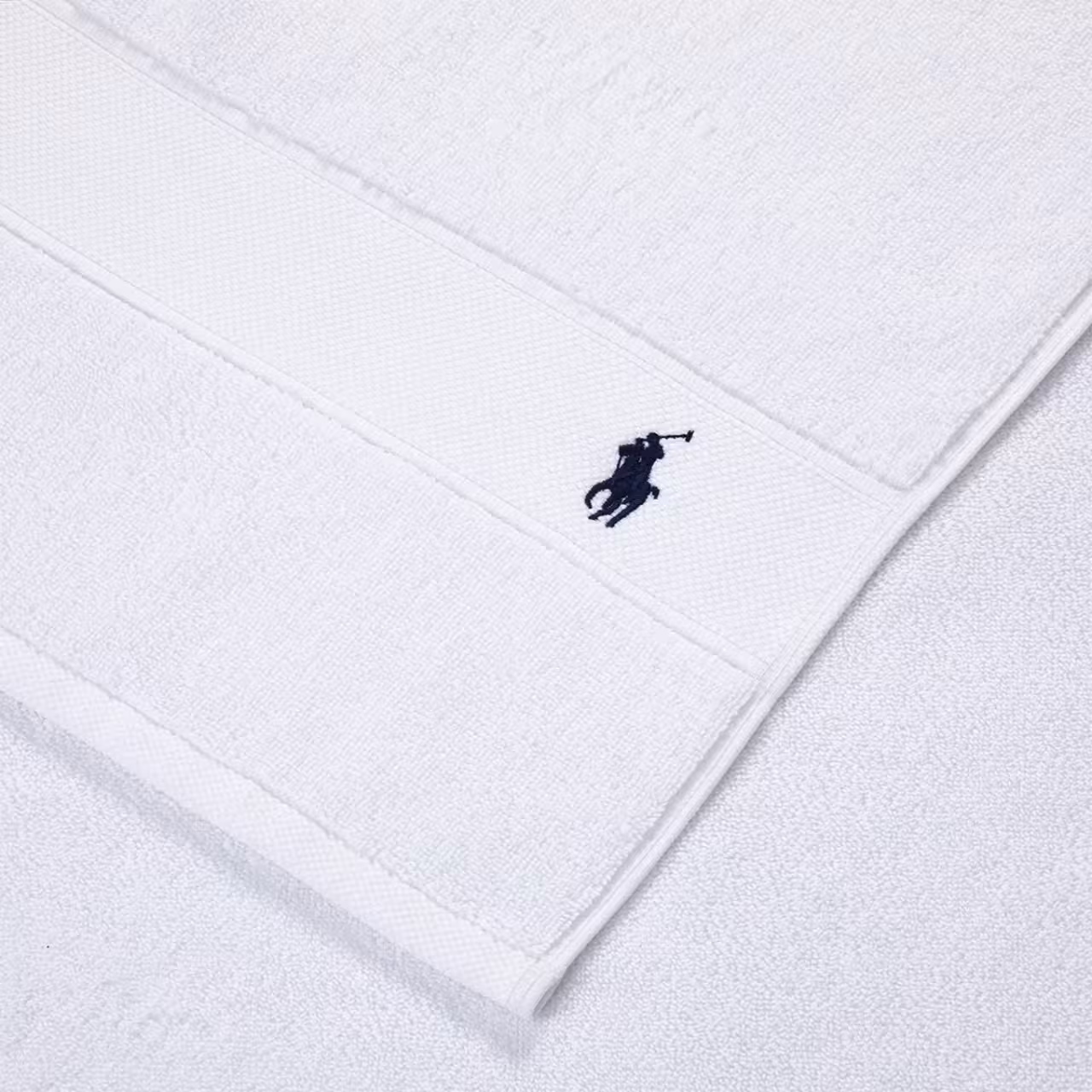 Polo Player Frottier weiß Detail Logo Stickerei