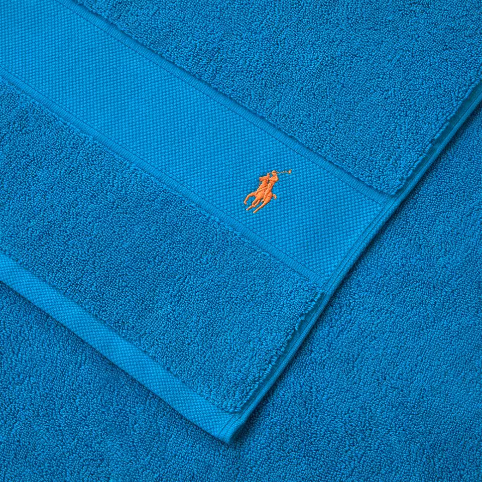 Polo Player Frottier cyan Detail Logo Stickerei