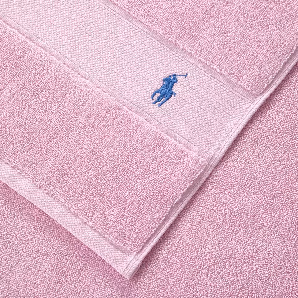 Polo Player Frottier rosa Detail Logo Stickerei