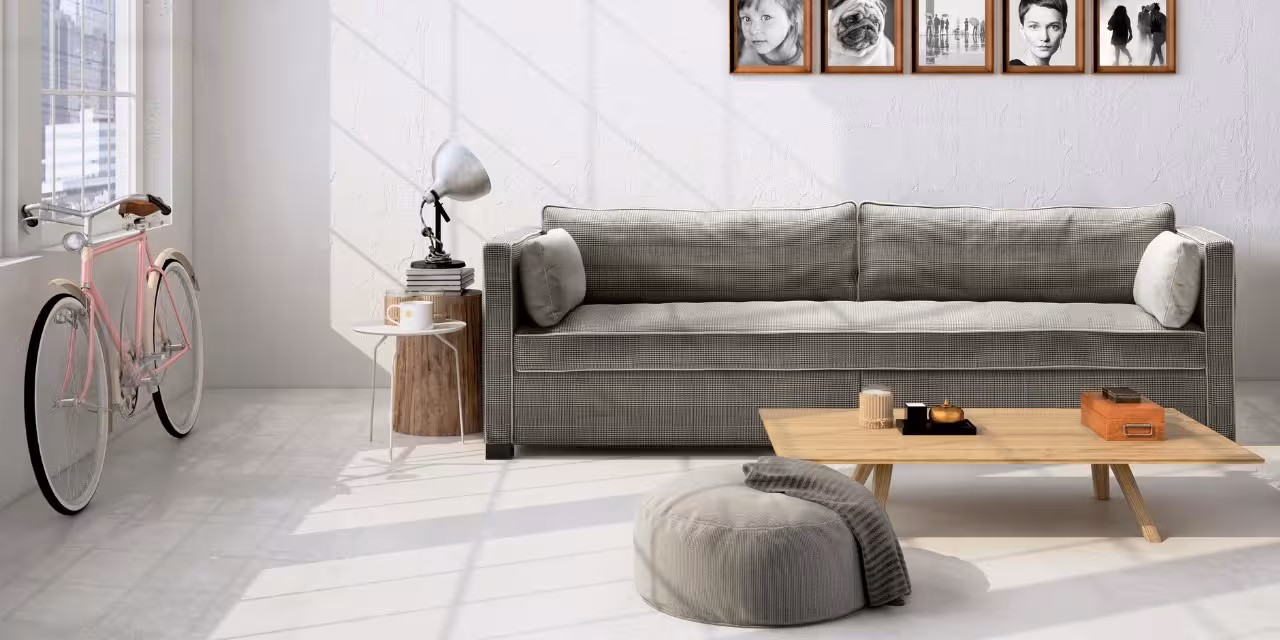 Graues Sofa in Loftwohnung