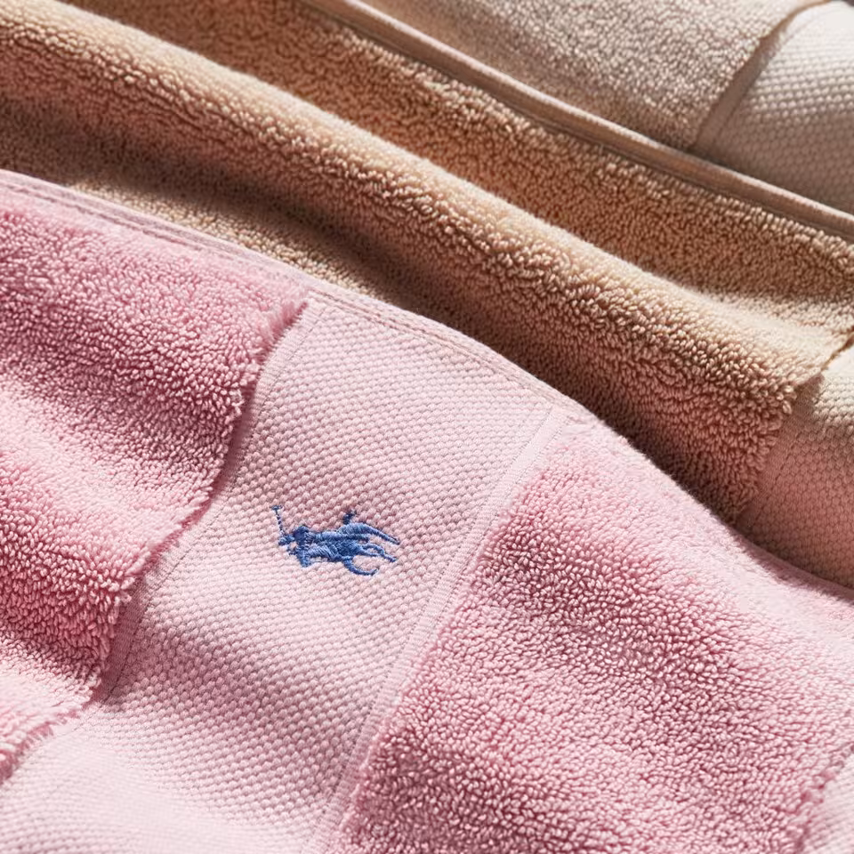 Polo Player Frottier rosa Detail Logo Stickerei